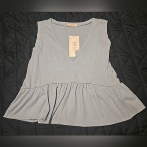 NWT Light blue knotch front sleeveless baby doll top